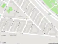 Ambulance met grote spoed naar de Damloperplein in Rotterdam