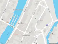 Brandweer met grote spoed naar de Kazernestraat in Muiden vanwege voertuigbrand