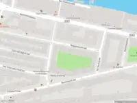 Ambulance met grote spoed naar de Van Linschotenstraat in Amsterdam