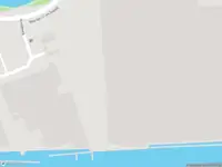 Ambulance met gepaste spoed naar de Barndegat in Zaandam