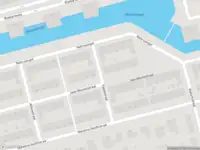 Ambulance met gepaste spoed naar de Sadatstraat in Rotterdam