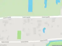 Ambulance met grote spoed naar de Zuiderlingedijk in Spijk