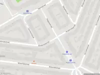 Ambulance met grote spoed naar de Huygensstraat in Rotterdam