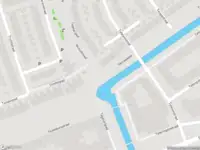 Ambulance met grote spoed naar de Tekkopstraat in Amsterdam