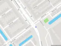 Brandweer met grote spoed naar de Naardermeer in Rotterdam vanwege gebouwbrand