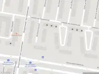 Ambulance met grote spoed naar de Burgemeester Rendorpstraat in Amsterdam