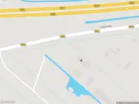 Ambulance met gepaste spoed naar de Schipholweg in Vijfhuizen