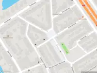 Ambulance met grote spoed naar de Julianastraat in Rotterdam