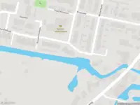 Ambulance met grote spoed naar de Nieuwlandsekade in Ouderkerk aan den IJssel