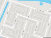 Ambulance met grote spoed naar de Van Eedenstraat in Ridderkerk