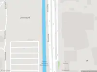 Ambulance met grote spoed naar de Oudeweg in Haarlem