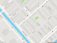 Ambulance met grote spoed naar de Atletiekbaan in 's-Gravenhage