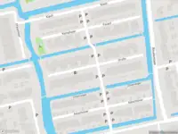 Ambulance met grote spoed naar de Scholekster in Leimuiden