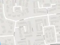 Ambulance met grote spoed naar de Lindenhof in Sleeuwijk