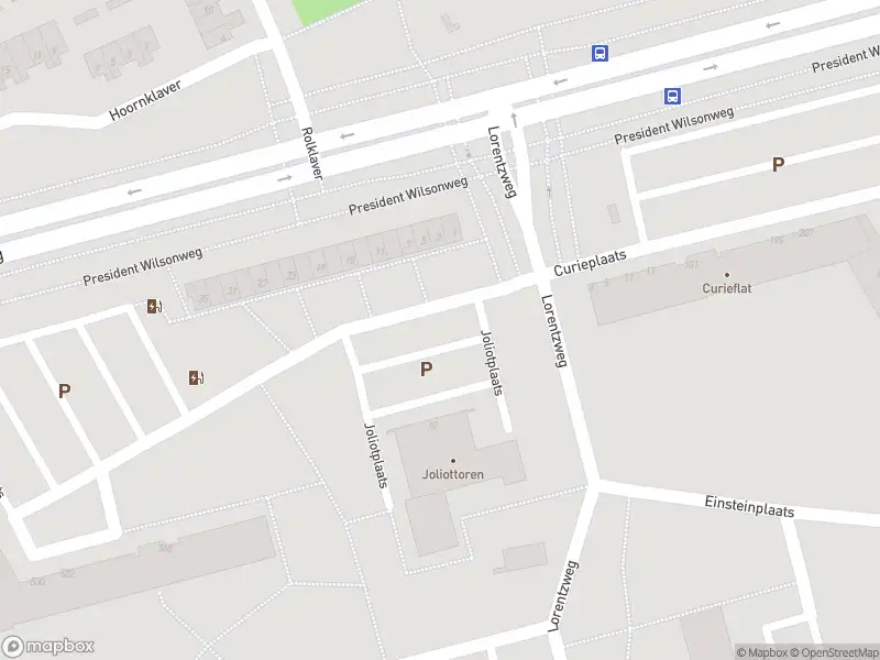 Ambulance met grote spoed naar de Joliotplaats in Rotterdam