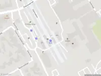 Brandweer met gepaste spoed naar de Stationsplein in Best