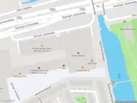 Ambulance met grote spoed naar de Koningin Julianaplein in Zaandam