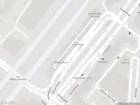 Ambulance met gepaste spoed naar de Dellaertweg in Leiden