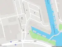 Ambulance met gepaste spoed naar de Centrale Groothandelsmarkt in Amsterdam