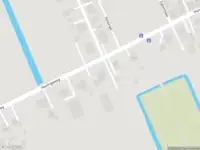 Ambulance en brandweer met grote spoed naar de Noorderstraat in Oostwold vanwege gebouwbrand