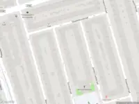 Ambulance met gepaste spoed naar de Torresstraat in Amsterdam