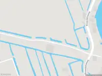 Ambulance met grote spoed naar de Binnendamseweg in Giessenburg