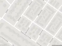 Brandweer met grote spoed naar de Bizetlaan in Oosterhout vanwege gebouwbrand