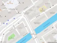 Ambulance met grote spoed naar de Sint Sebastiaansbrug in Delft