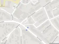 Brandweer met grote spoed naar de Voskuilenweg in Heerlen vanwege gebouwbrand