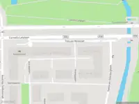 Ambulance met grote spoed naar de Titus van Rijnstraat in Amsterdam