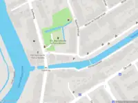 Ambulance met gepaste spoed naar de Zestienhovensekade in Rotterdam