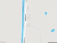 Politie met grote spoed naar de Noordpolderweg in Warffum vanwege voertuigen te water