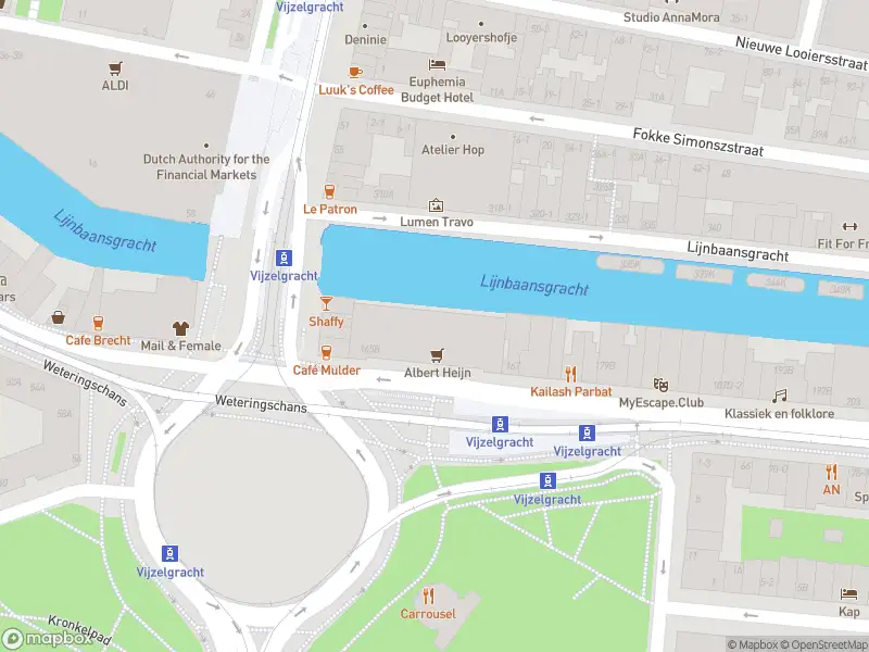 Ambulance met gepaste spoed naar de Weteringschans in Amsterdam