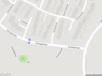 Brandweer met gepaste spoed naar de Carboonstraat in Heerlen vanwege een buitenbrand