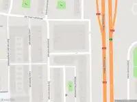 Ambulance met grote spoed naar de Alma Tademastraat in Amsterdam