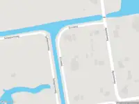 Politie naar de Ericaweg in Griendtsveen vanwege personen te water