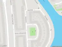 Ambulance met grote spoed naar de Geuzenkade in Amsterdam