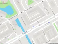 Ambulance met grote spoed naar de Martin Niemöllerstraat in Amsterdam