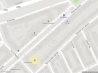 Brandweer met gepaste spoed naar de Bas Jungeriusstraat in Rotterdam