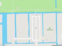 Brandweer met grote spoed naar de Nico Broekhuysenweg in Amsterdam vanwege voertuigen te water