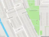 Ambulance met grote spoed naar de Slichtenhorststraat in Amsterdam