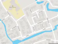 Ambulance met grote spoed naar de Hennebos in Koedijk