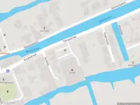 Ambulance met grote spoed naar de Dorpsstraat in Molenaarsgraaf