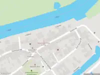 Ambulance met grote spoed naar de Voorstraat in Heukelum