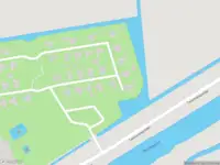 Ambulance met gepaste spoed naar de Tweemanspolder in Zevenhuizen