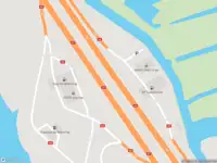 Ambulance met grote spoed naar de Coentunnelweg in Oostzaan