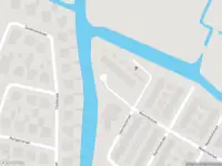 Ambulance met grote spoed naar de Wederikstraat in Krommenie