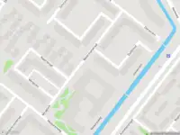 Ambulance met gepaste spoed naar de Watermanstraat in Amsterdam