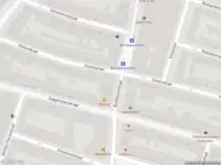 Ambulance met grote spoed naar de Benthuizerstraat in Rotterdam