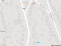 Brandweer met grote spoed naar de Dorpsstraat in Riethoven vanwege gebouwbrand